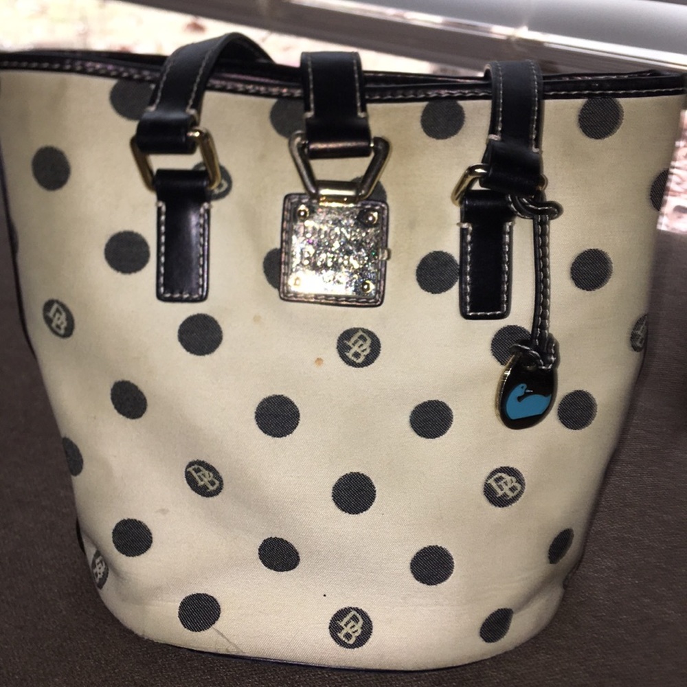 Need some love and care Dooney and Bourke purse